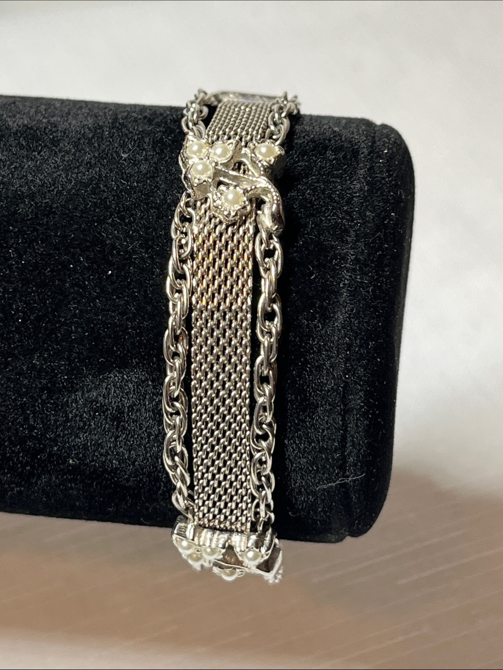 Vintage silver tone bracelet with unique rope designs.